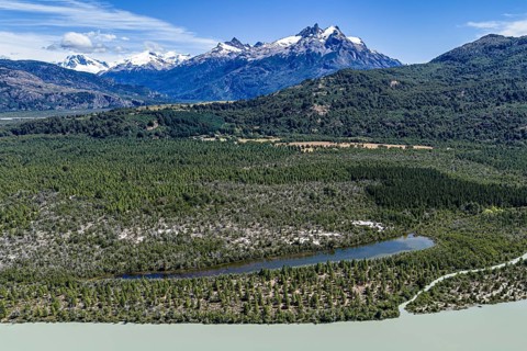 River rio delta o el leon, mountain range of Valle Exploradores in the back, aerial view,