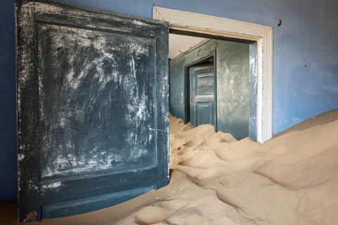 At Kolmanskop, the abandoned ghost town of the diamond days of the early 1900 and of German origin.