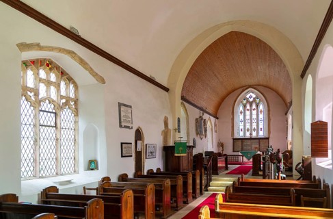 Interior view of nave to east window and altar, Holy Trinity church, Middleton, Suffolk, England,