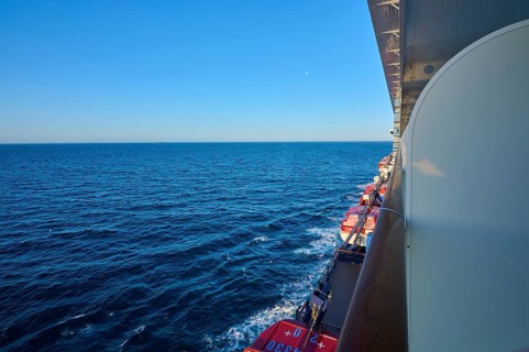 View from cruise ship, Mein Schiff 6, onto the wide sea under a blue sky, autumn, North Sea,
