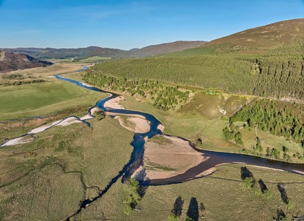 Aerial view of the course of Clunie River near Braemar, Cairn Gorms national Park, Scotland, UK