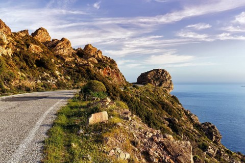 Striking rocky coast, evening sun, Messinian Gulf, Ionian Sea, Mani, Greece