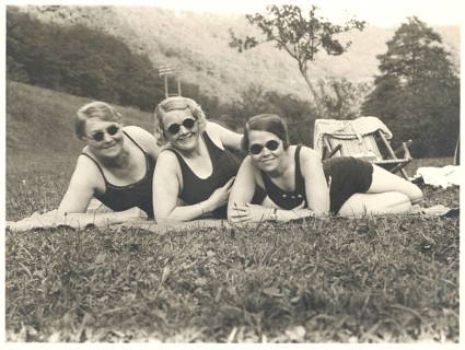 Heinkyller Mühle, Bitburg, Eifel, Baden, swimwear, Three woman lying on the lawn in bathing suits