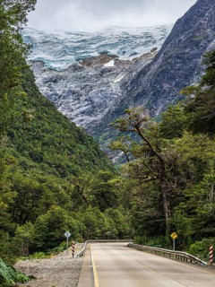 Road Carretera Austral south of Puyuhuapi, glacier above rain forest, Patagonia, Chile