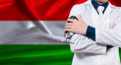Hungarian national health system, Medical professional holding sthetoscope isolated