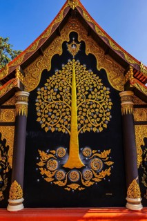 Gilded tree of life at the Buddhist temple Wat Phra That Don Phra Chan, near Lampang, Lampang