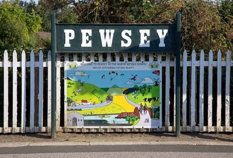 Welcome sign to Pewsey, North Wessex Downs, Pewsey railway station, Wiltshire, England, UK