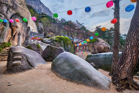SEORAKSAN, SOUTH KOREA, APRIL 14, 2017: Kyejoam Seokgul Hermitage shrine and Ulsanbawi rock in