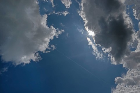 Rain clouds (Nimbostratus) with sunshine, Franconia, Bavaria, Germany