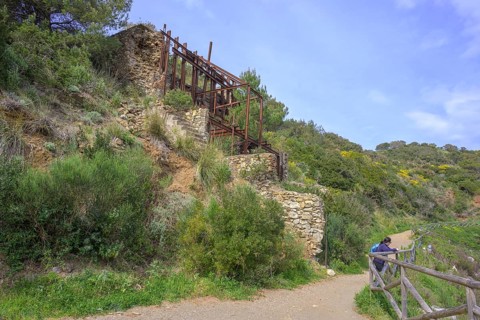 Rusted remains at a mine, Porto Azzurro, Livorno province, Italy