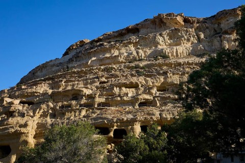 Neolithic caves, former hippie paradise, sandstone cliffs with natural caves and footbridges under