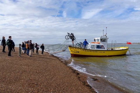 People, bikes, harbour ferry, beach, Felixstowe, England, Great Britain