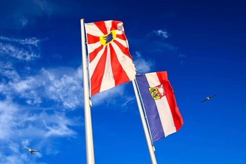 Flags from Scharbeutz and Schleswig-Holstein in Scharbeutz, Schleswig-Holstein, Germany +++