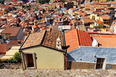 View of the historic old town of Sa Costa, colorful sea of houses, roof landscape, terracotta