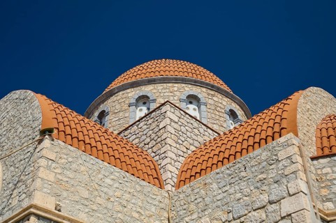 Agiou Sarvas monastery, Agion Pandon church, close-up of a stone church dome under clear sky,