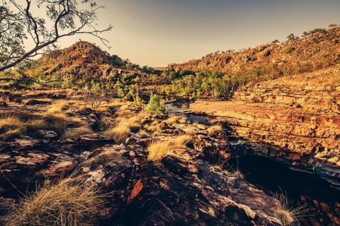 Bell Gorge waterfall, a body of water in north-west Australia in the Kimberley. Sunrise in the