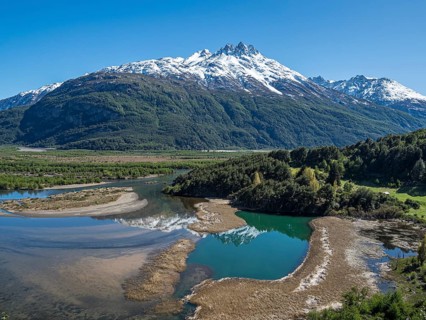 The widely branching arms of river Rio Ibanez, near Villa Cerro Castillo, reflections on the water,