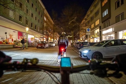 Cycling in the city, in the dark, in the evening, inner-city road, bicycle road, two-wheeler