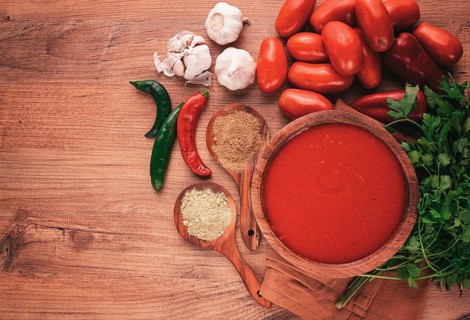 Georgian sauce, Satsebeli sauce, tomato and sweet pepper sauce, with spices, in a wooden bowl,