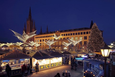 New town hall and neo-gothic market church at shooting star market, fairy lights Christmas market,