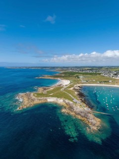 Aerial view of the sandy beaches Plage de Porspaul, right, Plage Porsguen left, Commune
