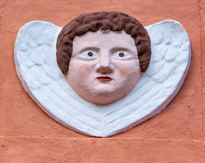 Old angel figure, late Renaissance stone carving, Rinnesches Haus, Kornmarkt, Osterode am Harz,