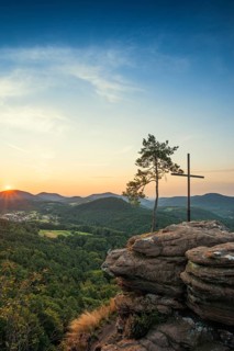 Sandstone rock with pine tree and summit cross, Rötzenfelsen, sunrise, Gossersweiler-Stein,