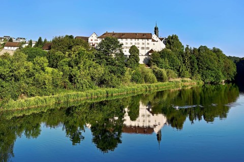 Hermetschwil Abbey (Benedictine abbey), on Lake Flachsee in spring, Rottenschwil, Canton of Aargau,