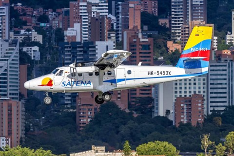 A SATENA De Havilland Canada DHC-6-400 Twin Otter aircraft with license plate HK-5453X at Enrique