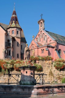 Castle with St. Leo IX chapel and fountain with statue of Pope Leo IX, Eguisheim, Haut-Rhin,