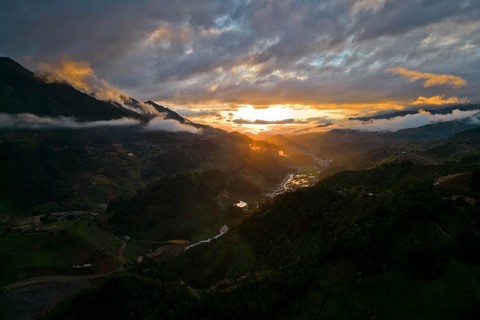 Aerial view, sunset in the mountains and rice terraces just in front of setting the new trip at Mù