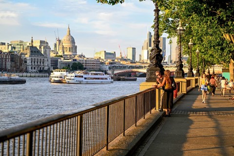 People on the banks of the Thames, in the background St Paul's Cathedral, City of London, London,