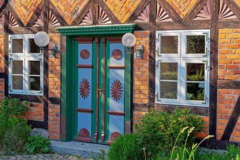 Historic half-timbered house with colorful door Born Darß Baltic Sea Germany