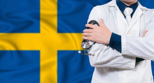 Swedish national health system, Medical professional holding sthetoscope isolated