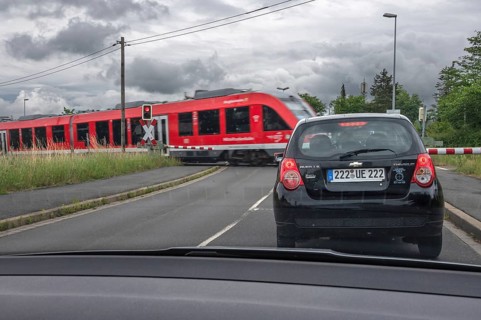 Gräfenbergbahn, suburban railway crosses a restricted level crossing, Eckental, Middle Franconia,
