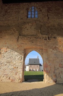 UNESCO Carolingian monastery with façade and view through gate to King's Hall, Lorsch, Bergstrasse,