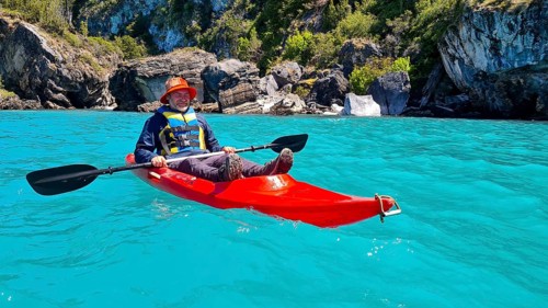 Man with boat in Lago General Carrera in Patagonia on the Carretera austral, Patagonia, Chile