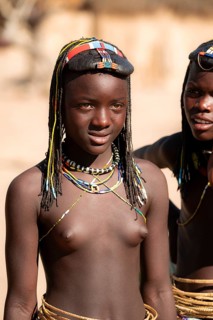 Portrait, brightly decorated girl of the Hakaona tribe, also Havakona or Hakawona, near Opuwo,