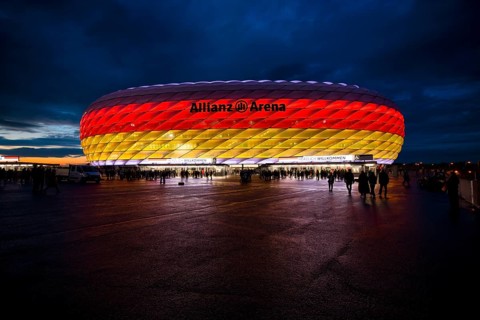 Night shot, stadium, illuminated, illuminated, in German national colours, black-red-gold, UEFA
