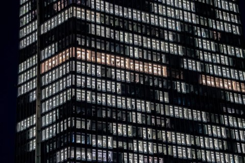 The building of the European Central Bank, ECB, in Frankfurt am Main, illuminated windows, offices,