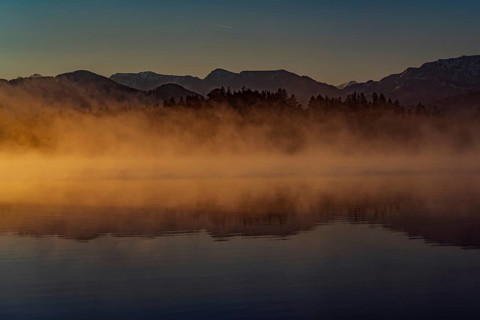 Autumnal morning atmosphere at Schmutter Weiher with fog near Lechbruck, Halblech and Roßhaupten in