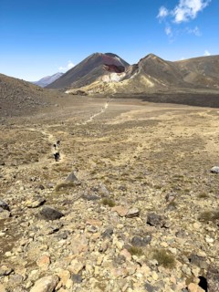 On the hiking trail of the Tongariro Alpine Crossing in Tongariro National Park with a view of the