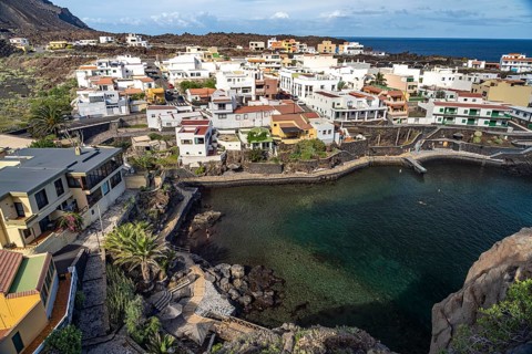 View from the Mirador El Tamaduste of the natural swimming pool and the village of Tamaduste, El