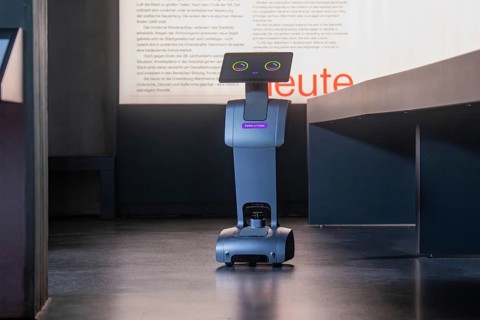A robot with a display is in a modern exhibition, Museum Robot Robolutions, Marchivum, Mannheim,
