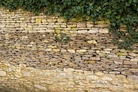 Stone wall, ivy, Bibury, The Cotswolds, England, Great Britain