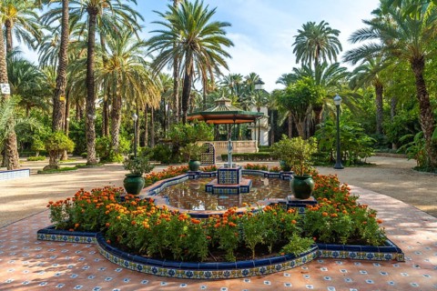 Temple or pergola with a fountain in the Palm Grove Park in the city of Elche. Spain