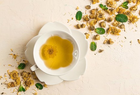 Chrysanthemum tea, drink, white cup, mint, chrysanthemum buds, close-up, no people