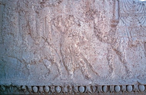 Battle of a dragon with a god on his chariot in the presence of other deities, Bel Temple, Palmyra,