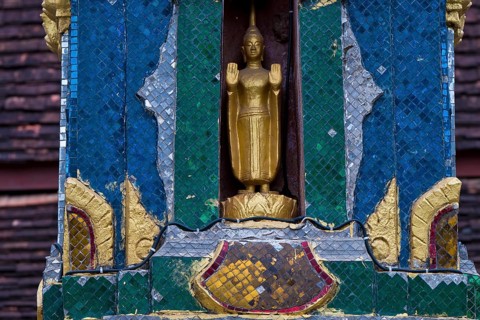 Small golden Buddha at Wat Xieng Tong, Luang Prabang, Laos