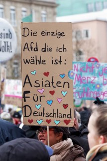 Banner against the AfD with original text, Asians For Germany, demonstration against right-wing